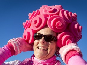 Jenn Tregale mugs for a photo before the start of the Canadian Breast Cancer Foundation CIBC Run for the Cure at Southcentre Mall in Calgary on Oct. 2, 2016.