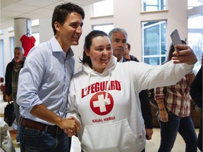Prime Minister Justin Trudeau poses for a selfie at Medicine Hat College earlier this month in advance of Monday's byelection.