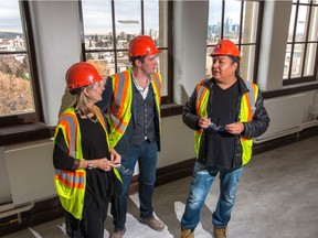 Left to right Michele Stanners, executive director of the Making Treaty 7 Cultural Society, Reid Henry president and CEO of CSpace Projects and Troy Emery Twigg, artistic director of the Making Treaty 7 Cultural Society at the renovated King Edward School in Calgary, Ab., on Thursday October 20, 2016. Mike Drew/Postmedia