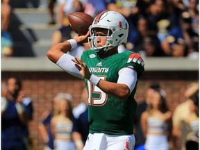 Brad Kaaya of the Miami Hurricanes drops back to pass during the first half against the Georgia Tech Yellow Jackets at Bobby Dodd Stadium on October 1, 2016 in Atlanta, Georgia.