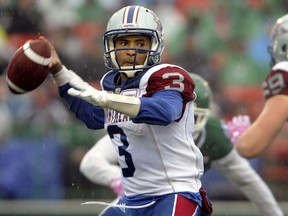 Montreal Alouettes quarterback Vernon Adams Jr. spots a receiver through the rain during first half CFL action against the Saskatchewan Roughriders, in Regina on Saturday, October 22, 2016.