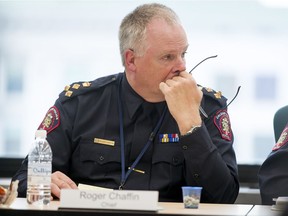 Calgary Police Chief Roger Chaffin sits during a Calgary Police Commission public meeting in downtown Calgary, Alta., on Tuesday, Oct. 25, 2016.