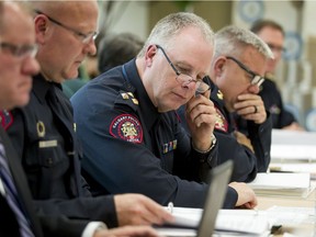 Calgary Police Chief Roger Chaffin sits during a Calgary Police Commission public meeting in downtown Calgary, Alta., on Tuesday, Oct. 25, 2016.