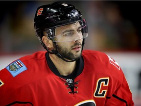 Calgary Flames captain Mark Giordano in warm up before facing the Vancouver Canucks in pre-season hockey in Calgary on Sept. 30, 2016.