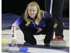 Chelsea Carey watches a rock during game action against Kelsey Rocque's team at the Grand Slam of Curling's Humpty's Champions Cup held at the Sherwood Park Arena on April 26, 2016.