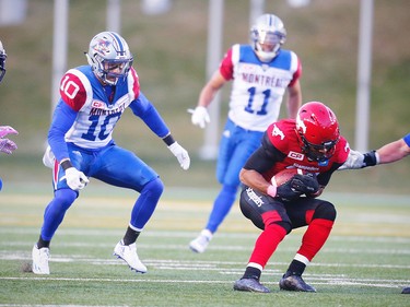 Calgary Stampeders Marquay McDaniel with a catch in front of Montreal Alouettes defense during CFL football in Calgary, Alta., on Saturday, October 15, 2016. AL CHAREST/POSTMEDIA
