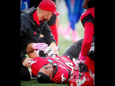 Calgary Stampeders Deron Mayo after being injured in a game against the Montreal Alouettes in Calgary, Alta., on Saturday, October 15, 2016. AL CHAREST/POSTMEDIA