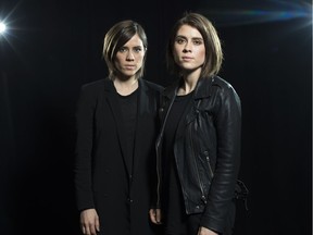 In this May 12, 2016 photo, Sara Quin, left, and Tegan Quin, of the Canadian singing duo Tegan and Sara, pose for a portrait in New York. The sisters released their eighth album, Love You to Death, in June and will launch an international tour this fall.