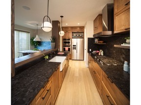 The kitchen in a new showcase home by Homes by Dream in EvansRidge.
