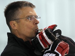 Flames assistant coach Dave Cameron, wshown here at the Ottawa Senators training camp in 2011, got his start in the 1990s coaching in Michigan.