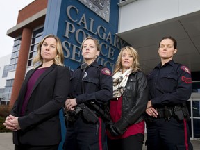 Sgt. Jodi Gach, Const. Nicole Barrett, Analyst Trish Pace, and Sgt. Tracey Johnson of the Calgary Police Service stand for a photo at the Calgary Police Service headquarters in Calgary, Alta., on Wednesday, Oct. 26, 2016. They refute claims of sexism and and an oppressive work environment that were recently made public through the release of an internal workforce review. Lyle Aspinall/Postmedia Network