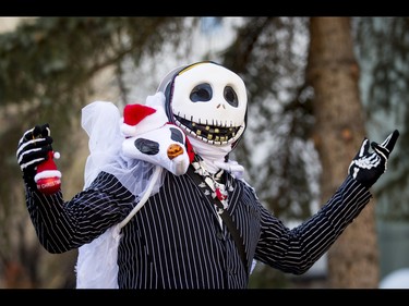 Jonathan Matthie mugs for a photo before the Zombie Walk in downtown Calgary, Alta., on Saturday, Oct. 15, 2016. The Zombie Walk is an annual event held mostly for fun but also to raise money and cash for the Calgary Food Bank. Lyle Aspinall/Postmedia Network