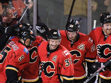 The Calgary Flames celebrate scoring on the Toronto Maple Leafs in the first period of NHL action at the Scotiabank Saddledome in Calgary on Wednesday November 30, 2016.