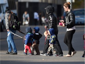 Daycare workers walk toddlers on leads downtown in Edmonton on Tuesday Oct. 6, 2015.  (photo by John Lucas/Edmonton Journal)(standalone)