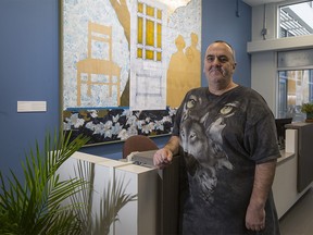 CALGARY, AB -- Les Hosford, a client at the Mustard Seed, poses for a photo in the waiting room of the Seed's new Wellness Centre on its grand opening in Calgary, on November 18, 2016. --  (Crystal Schick/Independent)