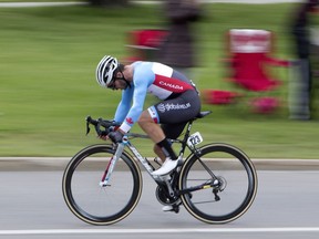 Alec Cowan takes part in time trial during stage 4 of the Tour of Alberta in Edmonton on Sunday, September 4, 2016.THE CANADIAN PRESS/Jason Franson ORG XMIT: EDM104