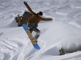 Brett Long of Calgary, enjoys some great early season riding in Paradise bowl at Lake Louise on opening day on Friday November 18, 2016. Al Charest/Postmedia