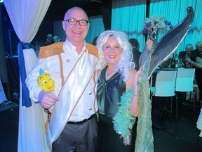 Dr. Roger Watson and his wife Janet Watson pulled out all the costume stops for the Jewels of the Sea themed  23rd Willow Park Wines & Spirits Charity Wine Auction held Nov 5 .