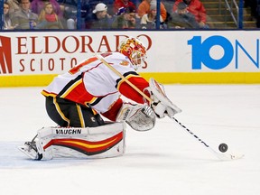 COLUMBUS, OH - NOVEMBER 23:  Chad Johnson #31 of the Calgary Flames makes a save during the second period of the game against the Columbus Blue Jackets on November 23, 2016 at Nationwide Arena in Columbus, Ohio. Johnson stopped 34 shots as Calgary defeated Columbus 2-0.