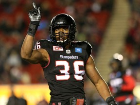 Calgary Stampeders Glenn Love celebrates during their game against Toronto Argonauts in CFL action at McMahon Stadium in Calgary, Alta.. on Friday October 21, 2016. Leah hennel/Postmedia ORG XMIT: POS1610212252130375