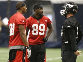Calgary Stampeders receivers Bakari Grant and DaVaris Daniels with QB Bo Levi Mitchell at practice at Monarch Park dome in preparation for Sundays' Grey Cup game in Toronto, Ont. on Wednesday November 23, 2016.