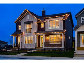 The front exterior of the Benedict show home by Homes by Avi in Savanna in Saddle Ridge.
