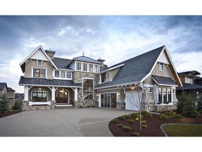 The front exterior of the Capetown show home by Wolf Custom Homes in Watermark at Bearspaw.