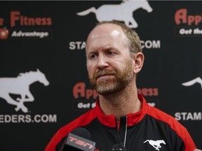 Calgary Stampeders head coach Dave Dickenson speaks to the media at the team's clubhouse in Calgary, Tuesday, Nov. 29, 2016.