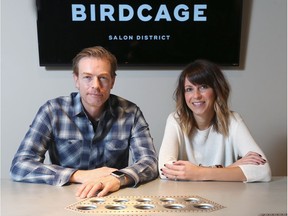 Craig and Emily LePan, in their Calgary office. They're opening Birdcage Salon District, Cafe & Wine Bar.