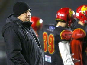 Calgary Dinosaurs Head Coach Wayne Harris oversees football practice at McMahon Stadium on Tuesday November 15, 2016. Jim Wells//Postmedia