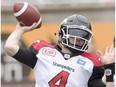 Calgary Stampeders quarterback Drew Tate throws a pass during first quarter CFL football action against the Montreal Alouettes Sunday, October 30, 2016 in Montreal.