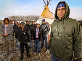 Elder Brad Fisher and Alpha House clients, including Colin James (in the white cowboy hat), at the location for a sweat-lodge ceremony on the Tsuu T'ina Nation west of Calgary, AB, on Friday November 18, 2016.