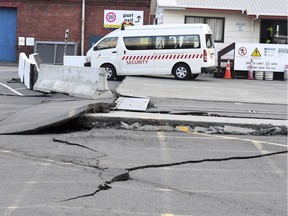 Fissures run along a road by the Centre Port in Wellington, Monday, November 14, 2016, after a major earthquake struck New Zealand's south Island early Monday.  A powerful earthquake struck in a mostly rural area close to the city of Christchurch but appeared to be more strongly felt in the capital, Wellington, more than 200 Km (120 miles) away. (Ross Setford/SNPA via AP) ORG XMIT: LON824