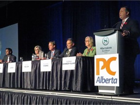 Former Conservative MP Jason Kenney speaks to 1,100 members in the first Alberta Progressive Conservative party leadership forum while the other five leadership candidates, Stephen Khan, left to right, Sandra Jansen, Byron Nelson, Richard Starke and Donna Kennedy Glans listen in Red Deer, Alta. Saturday, November 5, 2016. The PCs will pick a new leader at a delegated convention in March. THE CANADIAN PRESS/ Dean Bennett ORG XMIT: DxB101