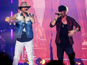 Bryan Kelly and Tyler Hubbard of Florida Georgia Line perform at the Saddledome in Calgary on Saturday, November 19, 2016.