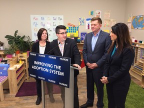 Adoption advocate Judith Kustermans, Wildrose house leader Nathan Cooper, Wildrose Leader Brian Jean and MLA Leela Aheer at Chestermere Montessori Preschool Academy. The Wildrose is calling for significant reforms to Alberta's adoption system.
