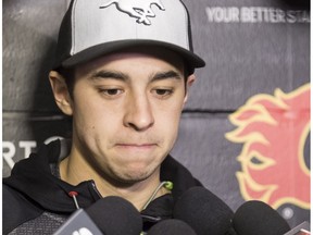 Johnny Gaudreau talks to media about his injured hand in Calgary, on November 18, 2016.