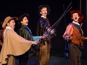 Jonas Swain as D'Artagnan, left, Kayla McArthur as Aramis, Jack Storwick as Athos and Zac Buller as Porthos perform a scene from The Three Musketeers at West Village Theatre in Calgary on Wednesday, Nov. 16, 2016. The Calgary Young People's Theatre production, written by The Outpatient Collective and based on the 1844 Alexandre Dumas novel, runs from Nov. 23 to Dec. 3, 2016.