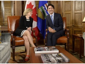 Prime Minister Justin Trudeau and Alberta Premier Rachel Notley speak during a meeting on Parliament Hill, Tuesday, Nov. 29, 2016 in Ottawa.