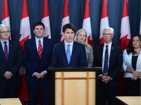 Prime Minister Justin Trudeau holds a press conference at the National Press Theatre in Ottawa on Tuesday, Nov. 29, 2016. Trudeau is approving Kinder Morgan's proposal to triple the capacity of its Trans Mountain pipeline from Alberta to Burnaby, B.C. -- a $6.8-billion project that has sparked protests by climate change activists from coast to coast.THE CANADIAN PRESS/Sean Kilpatrick ORG XMIT: SKP115