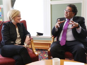 Premier Rachel Notley and Calgary Mayor Naheed Nenshi are at odds over the government's handling of power purchase arrangements returned by Alberta utilities.