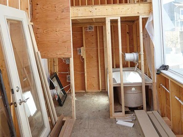 The secondary loft that will be used as storage and can be turned into a second bedroom, with bathroom and tub beneath.