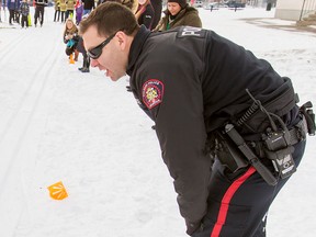 Const. Denis McHugh at a charity skiing event on Jan. 26, 2016.  Lyle Aspinall/Postmedia Network