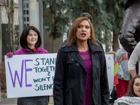 Nirmala Naidoo speaks at a rally to protest the bullying of women in politics at the Famous Five statues in Olympic Plaza in Calgary, Ab., on Thursday November 10, 2016. Mike Drew/Postmedia