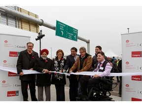 John McBain, president and CEO of Canada Lands Company; Darshan Kang, MP Calgary-Skyview; Judy Foote, minister of public services and procurement; Mayor Naheed Nenshi;
Calgary city councilor Brian Pincott; Calgary city councilor Evan Woolley; and Kent Hehr, MP Calgary Centre, Minister of Veteran Affairs and Associate Minister of National Defence at a celebration for the opening of the new Flanders Ave. interchange.