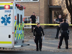 Police contain the scene of a suspicious death in the el Manor apartment building at 1819 - 17th Street S.W. on Tuesday, Nov. 22, 2016.