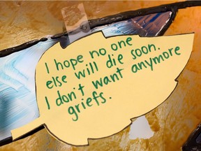 FILE PHOTO: Words from clients dealing with grief decorate the wall of the Sage Centre in Calgary on Wednesday November 23, 2016.