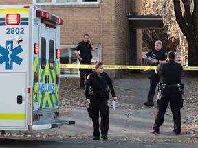 Police contain the scene of a suspicious death in the el Manor apartment building at 1819 - 17th Street S.W. on Tuesday November 22, 2016.  GAVIN YOUNG/POSTMEDIA