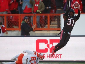 Calgary Stampeders Jamar Wall with a touchdown after the interception against the BC Lions  during 2016 CFL's West Division Final in Calgary, Alta., on Sunday, November 20, 2016.