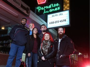 Teacher Graham MacKenzie, far right, stands with other volunteers who are putting on an all-ages music show at the Paradise Lanes bowling alley on Saturday. The event is one several they have organized for youth and newcomer students in Calgary.